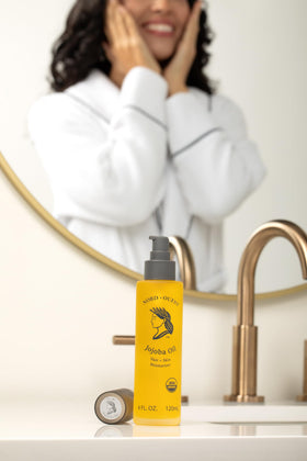 Nord-Ouest pump dispensing jojoba oil with precise drop for easy measured use