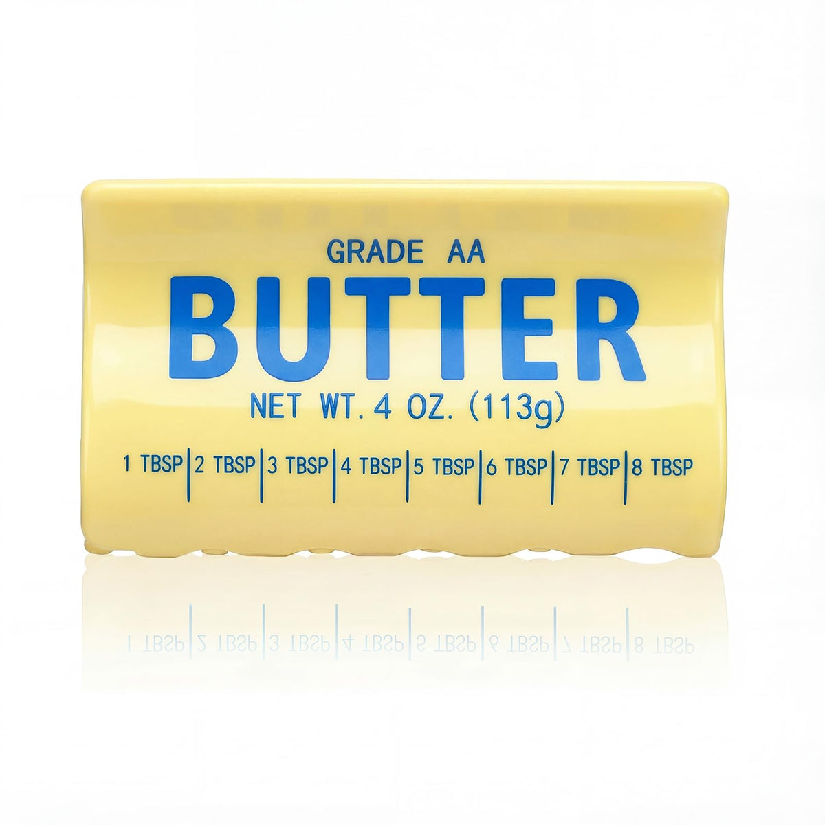 Norme butter clip front view showing glossy yellow finish and secure hold