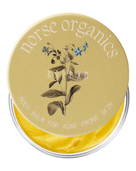 Norse Organics front packaging showing compact balm and clear labeling benefits
