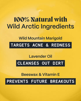 Norse Organics balm being applied to fingertip demonstrating targeted spot coverage and soothing