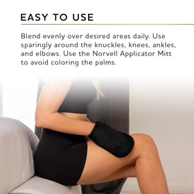 Norvell lotion drop on palm showcasing lightweight hydration for longer color