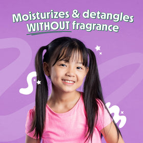 Not Your Mother's detangler spray in hand showing quick application and knot release