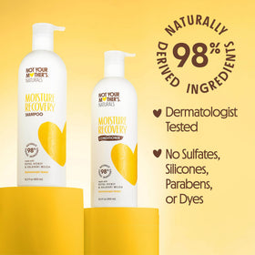Not Your Mother's bottles next to hand showing 15.2 fl oz scale benefit