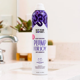 Not Your Mother's being sprayed at roots in salon-style setting to show fast refresh benefit