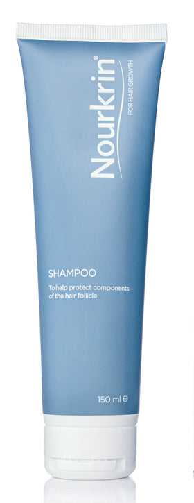 Nourkrin shampoo and conditioner staged in bathroom supporting daily care