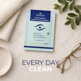 NOVEHA wipe in hand for size comparison showing compact, single-use practicality