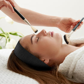 Noverlife headband used in shower and skincare keeping hair dry