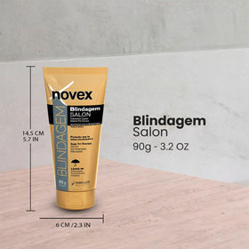 NOVEX applied to hair ends demonstrating smoother, frizz-controlled hair