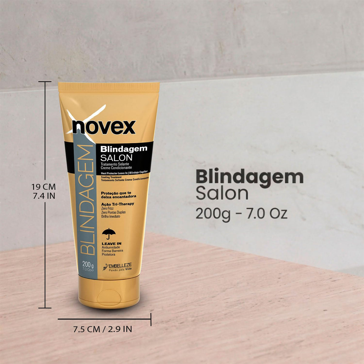 NOVEX in use while blow-drying demonstrating heat protection and smoother styling results