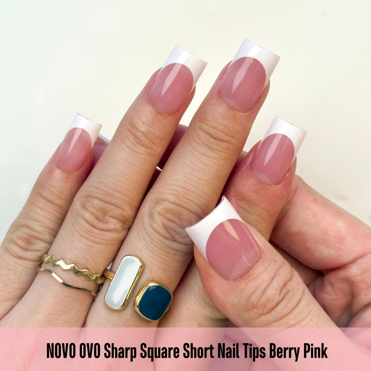 NOVO OVO close-up of white French tip and berry-pink detail for precise design clarity