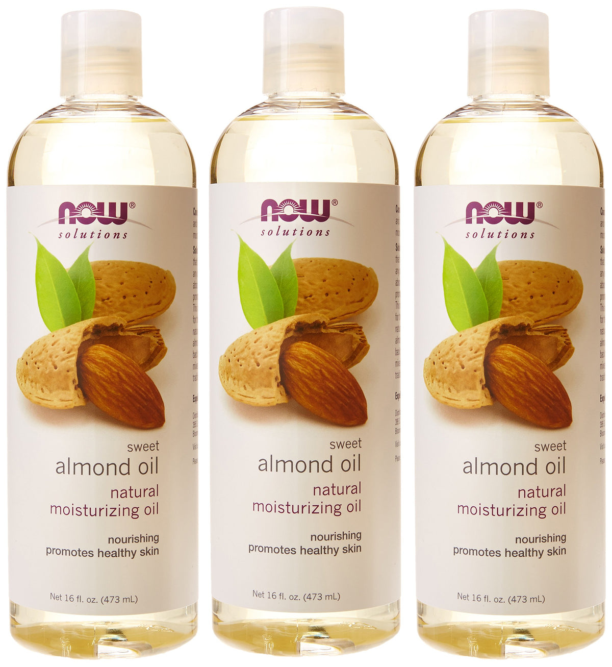 NOW Foods almond oil applied to hands in a lifestyle setting for moisturized skin