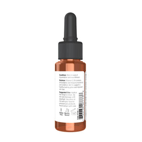 NOW Foods dropper close-up dispensing oil, highlighting precise application benefit