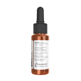 NOW Foods oil texture on skin close-up, demonstrating smooth moisturizing benefit