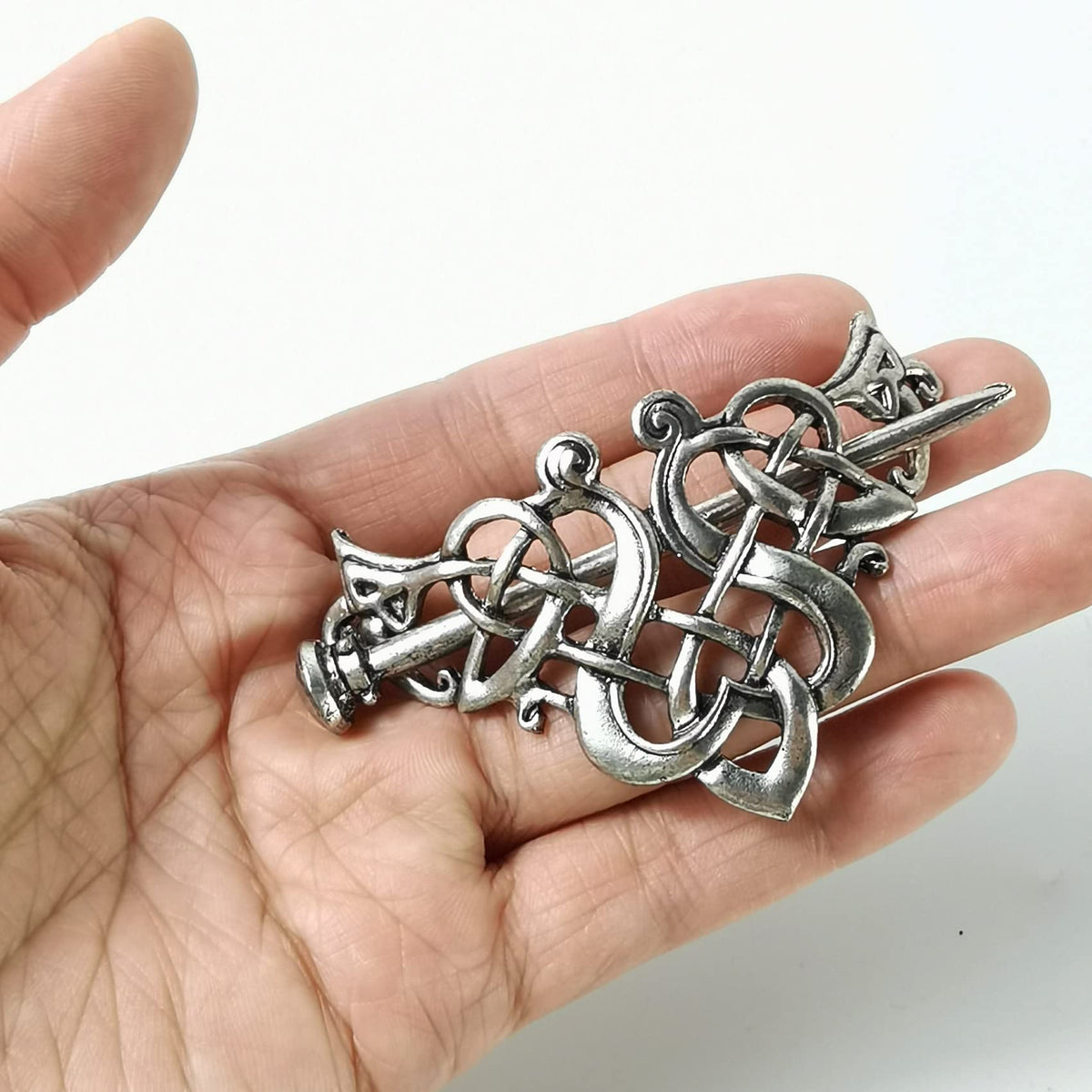 NSBELL close-up of Celtic knot detail highlighting textured metal finish and ornamental appeal