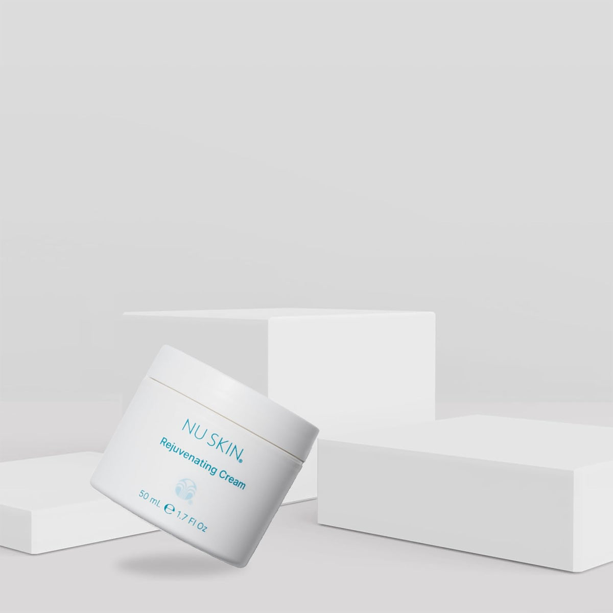 Nu Skin cream being applied on hand, demonstrates smooth moisturizing benefit
