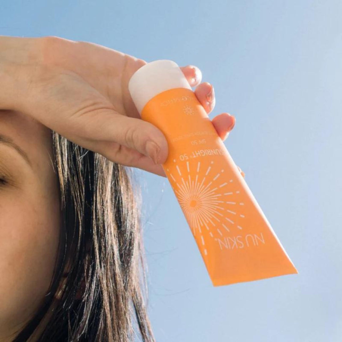 Nu Skin Sunright applied to face illustrating lightweight finish