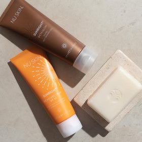 Nu Skin Sunright in use at the beach showing water‑resistant protection