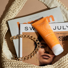 Nu Skin Sunright next to a coin for 3.4 fl. oz. size comparison