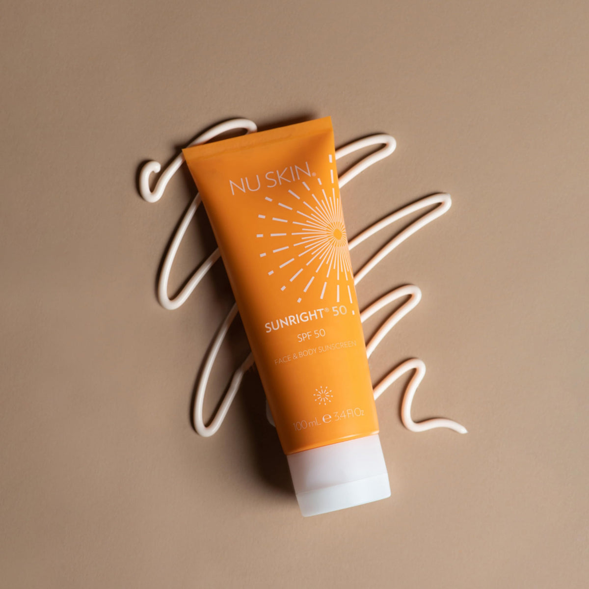 Nu Skin Sunright lotion texture on hand demonstrating fast absorption