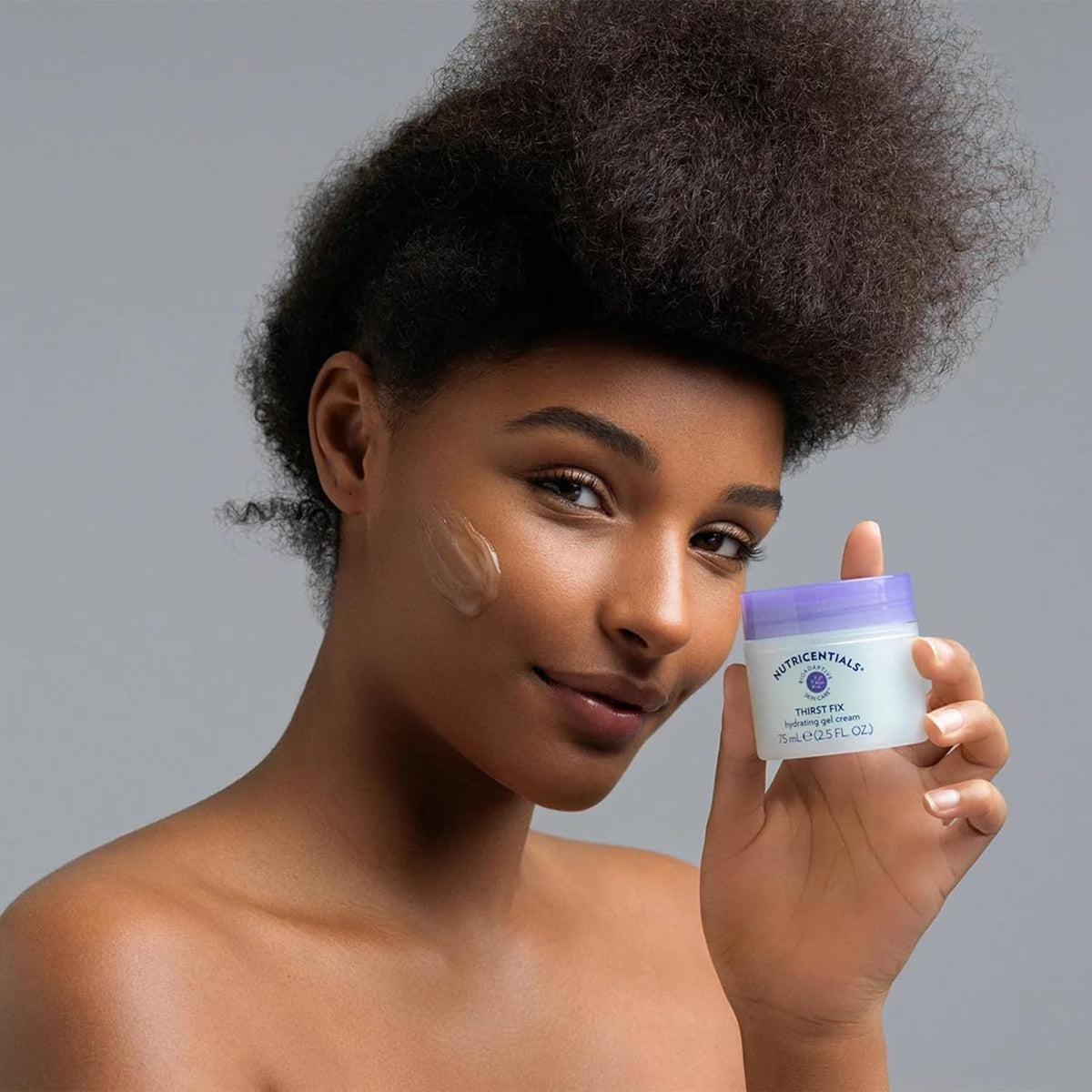 Nu Skin ThirstFix gel cream on hand demonstrating quick absorption and non-greasy feel