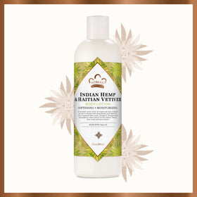 Nubian Heritage bottle on bathroom shelf evoking calming daily ritual