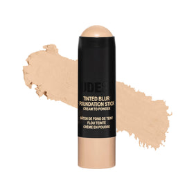 Nudestix foundation stick front packaging showing shade and travel benefit