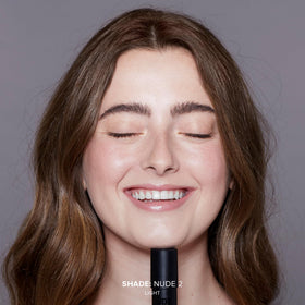 Nudestix texture close-up demonstrating cream-to-powder finish and smooth feel
