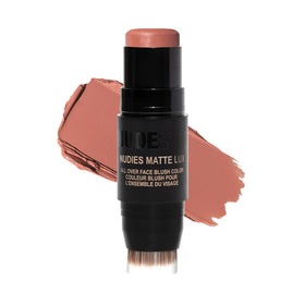 Nudestix front tin showing Nude Buff color and compact design benefit portability