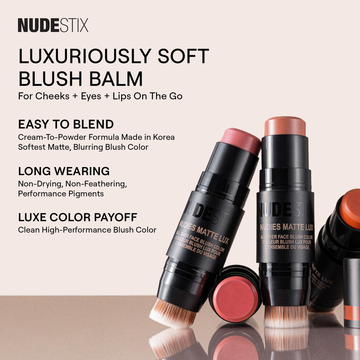 Nudestix hand holding tin illustrating product size and travel-friendly convenience
