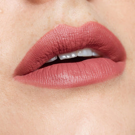 Nudestix close-up of creamy matte texture swatched to show blendability and pigment