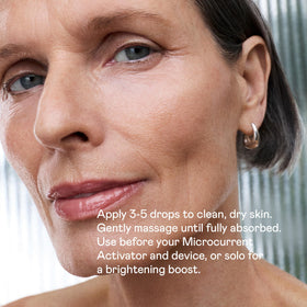 NuFACE serum in use with microcurrent device demonstrating enhanced conductivity benefits