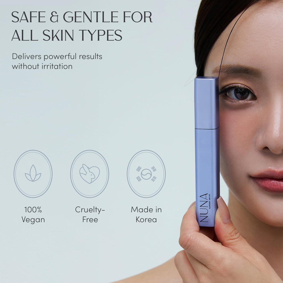 NUNA 6ml bottle in hand to show compact size and months of supply benefit