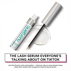 NuOrganic Cosmetics serum texture on fingertip highlighting smooth absorption