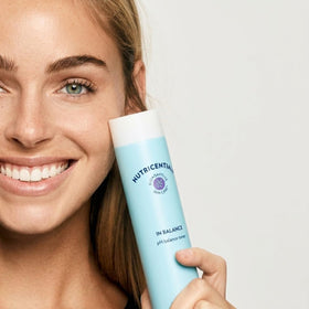 Nu Skin bottle texture close-up highlighting liquid clarity and hydration