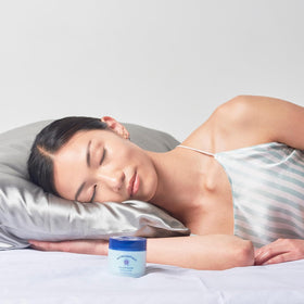 Nu Skin Pillow Glow open jar top view revealing smooth gel-cream ready for application