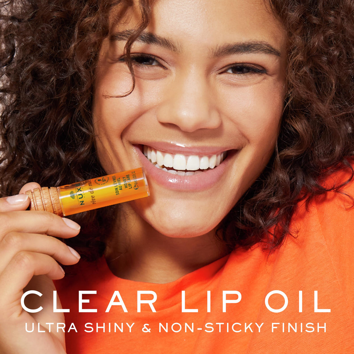 NUXE close-up of honey-spoon applicator for precise, mess-free application benefit