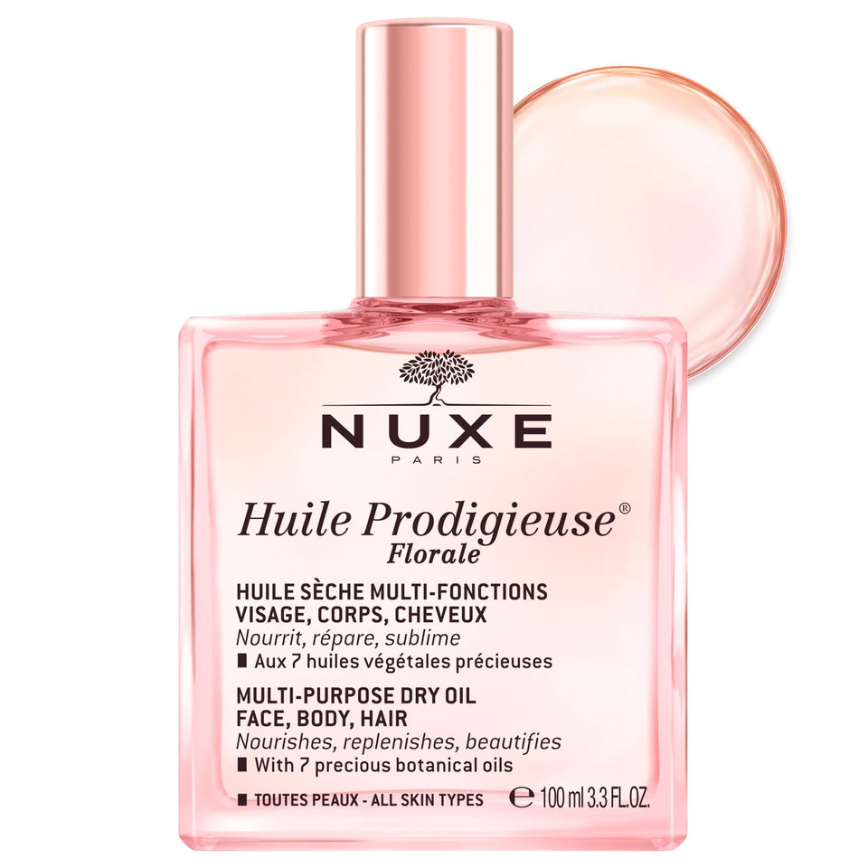 NUXE bottle front view showing elegant glass and floral label, highlighting brand luxury