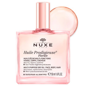 NUXE Huile Prodigieuse Floral front packaging showing elegant bottle and label benefit: portable glow