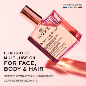 NUXE Huile Prodigieuse Floral pump dispense detail highlighting ease of controlled application