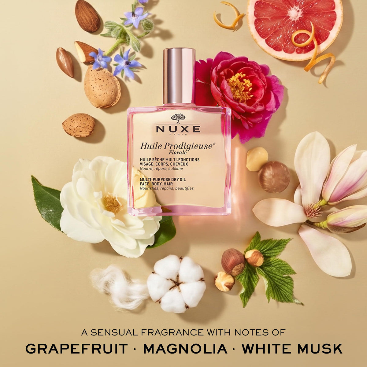 NUXE Huile Prodigieuse Floral size comparison with coin showing 1.6 oz travel-friendly convenience