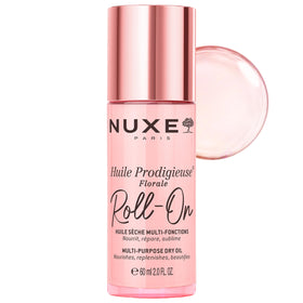NUXE roll-on front packaging showing compact floral dry oil benefit: easy application