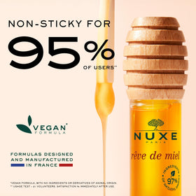 NUXE product held in hand to show size and travel-friendly portability benefit