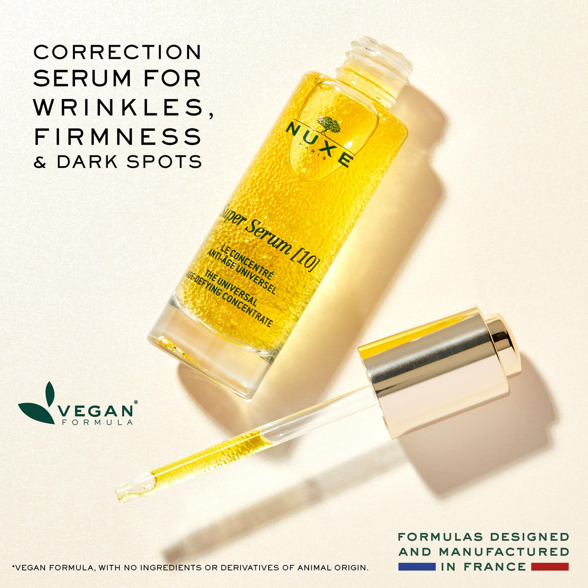 NUXE Super Serum close-up of micro-oil spheres texture, highlights lightweight absorbency