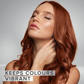 NYK1 on color-treated hair highlighting preserved vibrant shine benefit