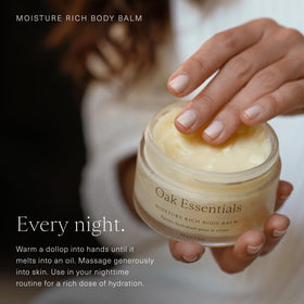 Oak Essentials applying balm to elbow to hydrate and soften rough skin