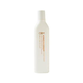 O&M bottle front view showing label and volumizing benefit