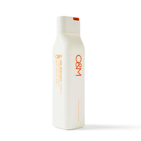O&M packaging detail highlighting brand and eco-conscious design