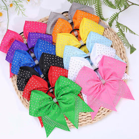 OAOLEER bow clipped to backpack showing decorative spirit and easy storage