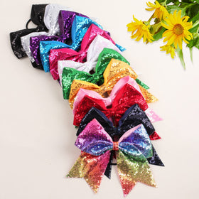 OAOLEER cheer bow worn in a ponytail during practice showing visibility and team use
