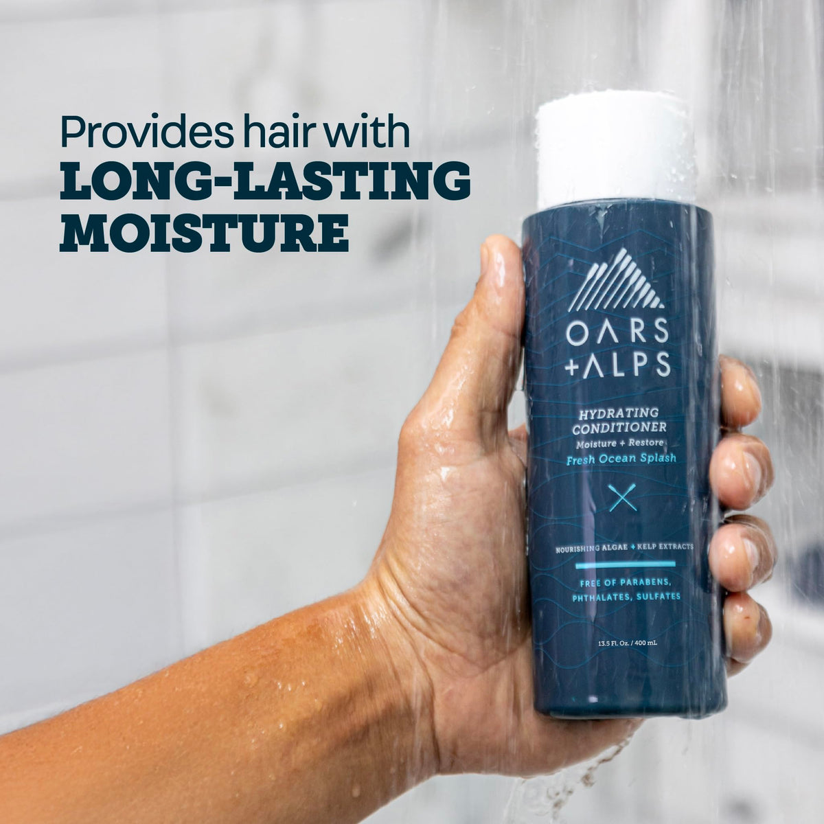 Oars + Alps conditioner cream on fingertip demonstrating lightweight consistency